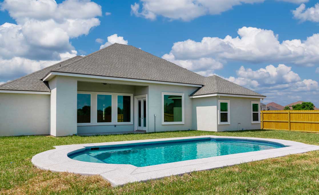 contemporary design and a scenic view of the pool area outside.